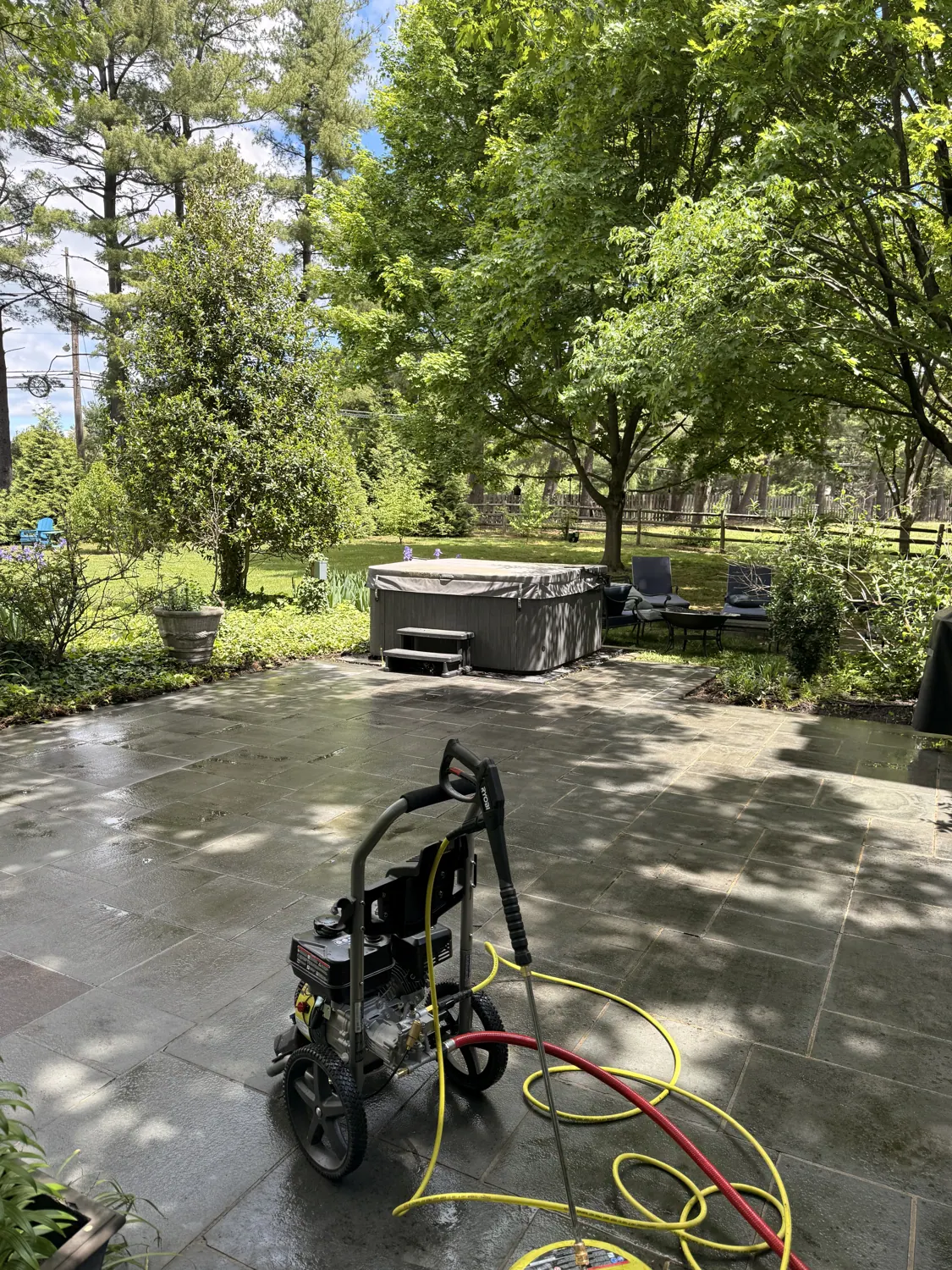 Patio being pressure washed